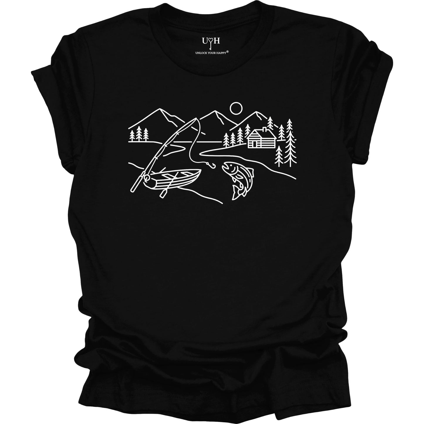 Black t-shirt featuring a minimalist white line art fishing design with mountains, river, canoe, fish, cabin, and pine trees.