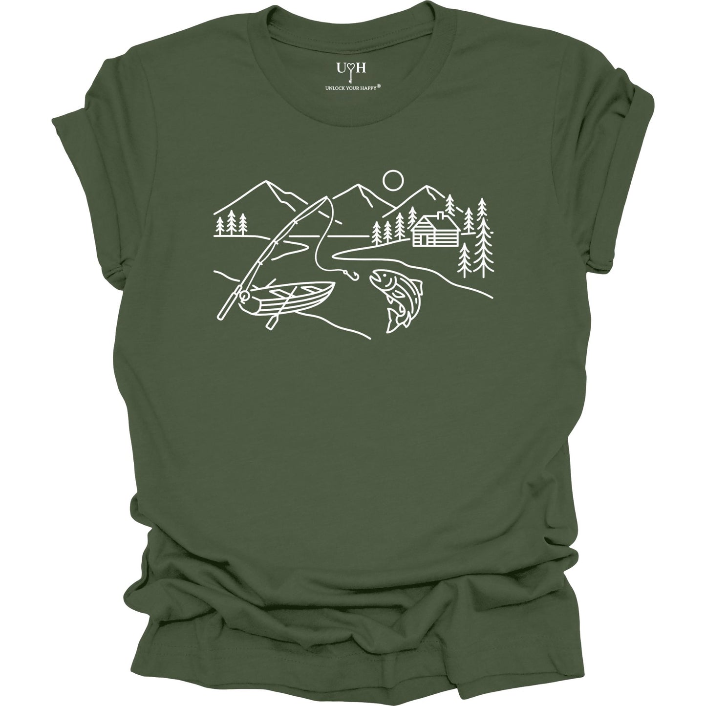 Green  t-shirt featuring a minimalist white line art fishing design with mountains, river, canoe, fish, cabin, and pine trees.