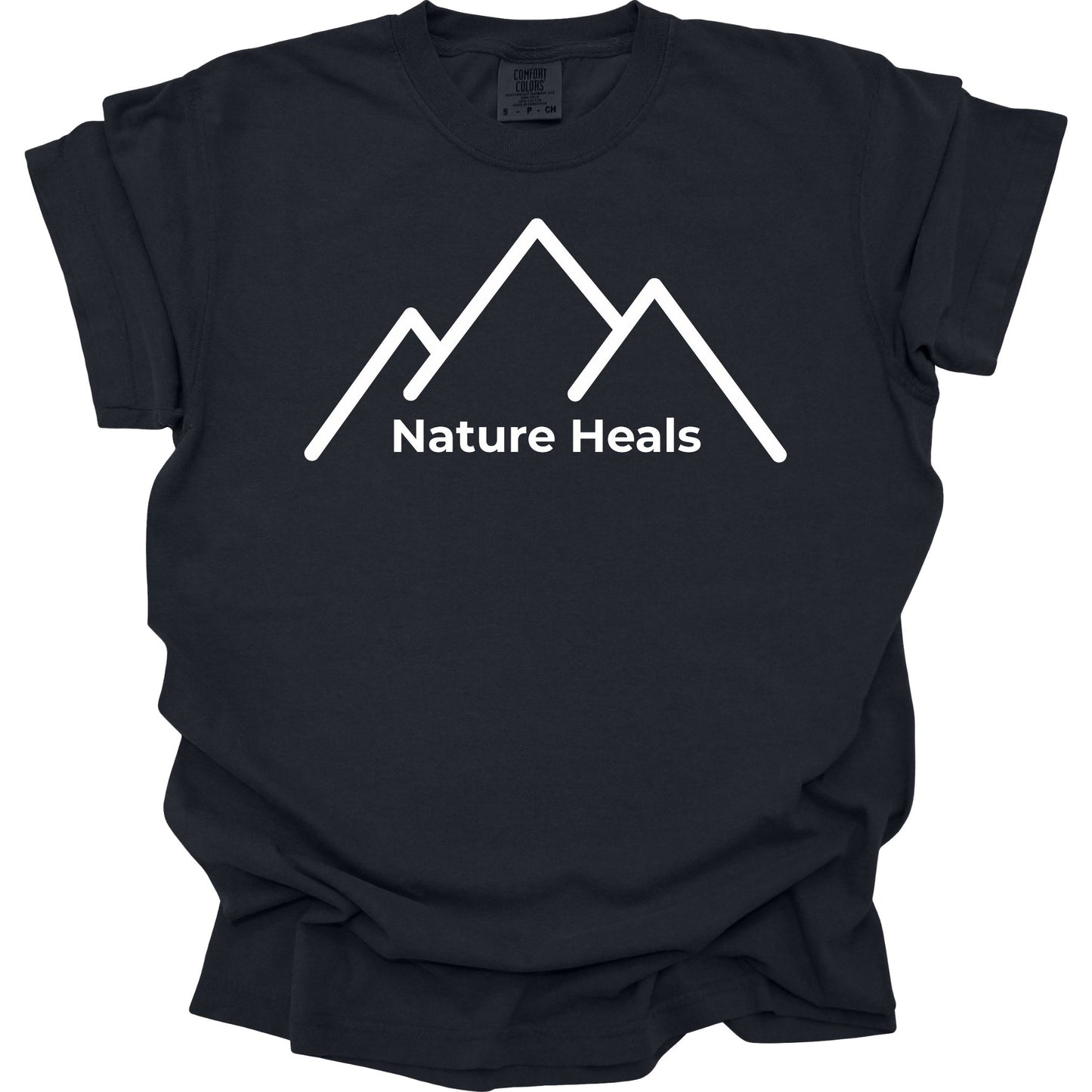 Black t-shirt with white mountain graphic and 'Nature Heals' text on a white background