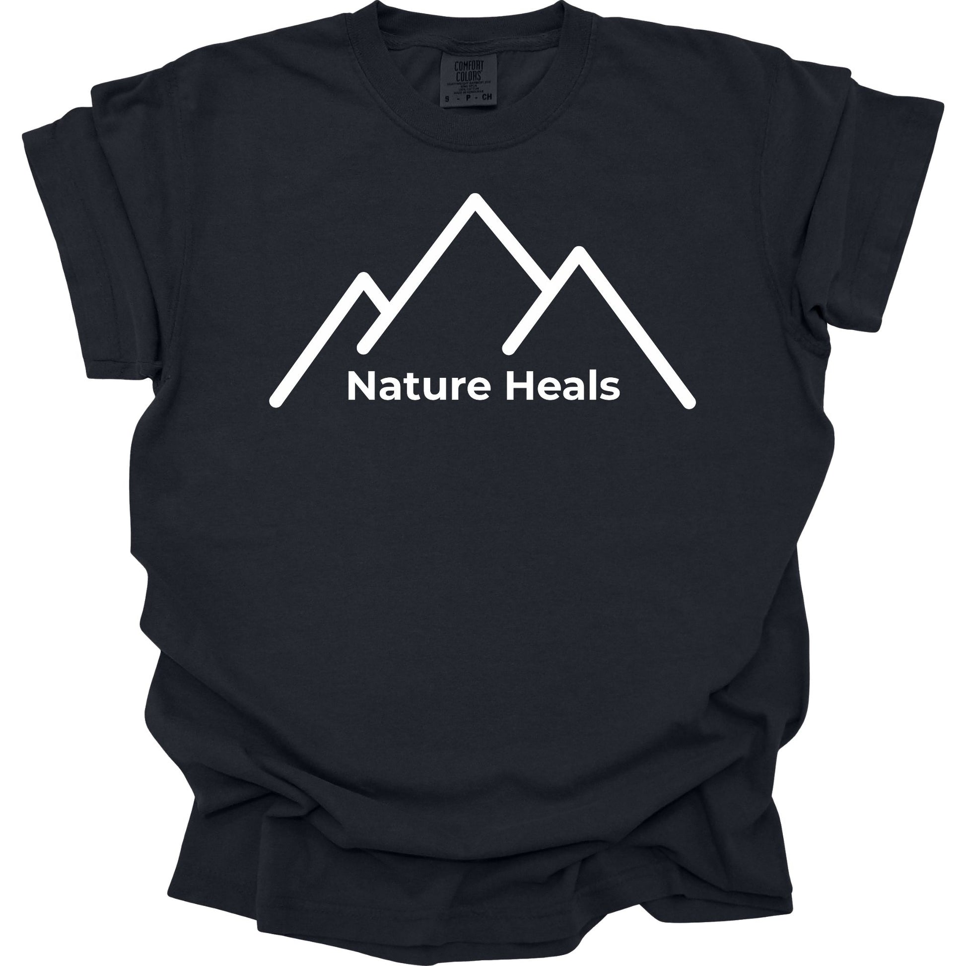 Black t-shirt with white mountain graphic and 'Nature Heals' text on a white background