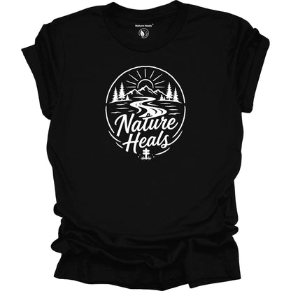 Nature Heals Text with Mountain, Pine Trees, River and Sun Graphic black t-shirt