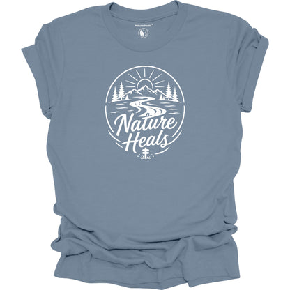 Nature Heals Text with Mountain, Pine Trees, River and Sun Graphic blue t-shirt