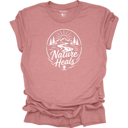 Nature Heals Text with Mountain, Pine Trees, River and Sun Graphic mauve t-shirt