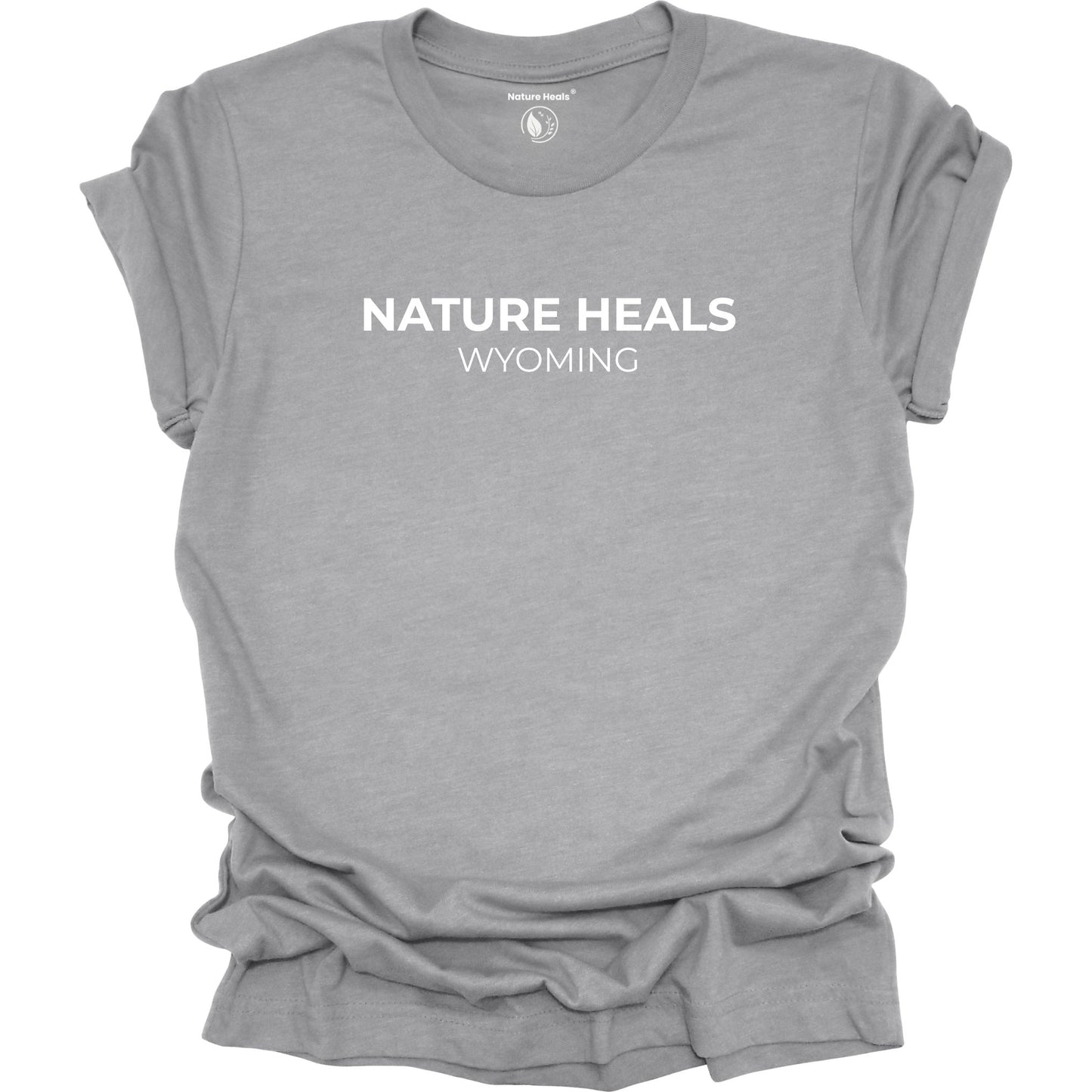 Gray t-shirt with 'Nature Heals Wyoming' text on a white background