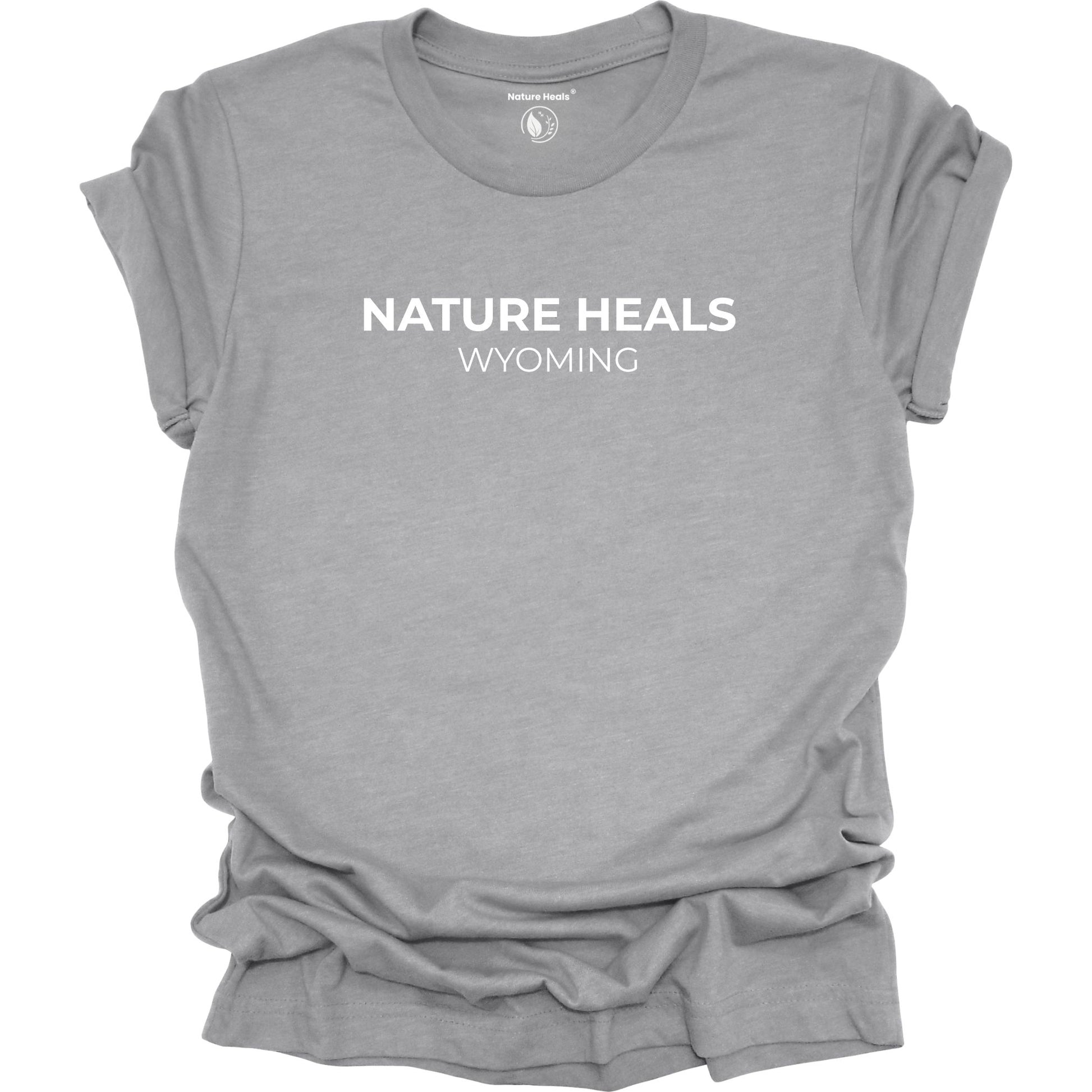 Gray t-shirt with 'Nature Heals Wyoming' text on a white background