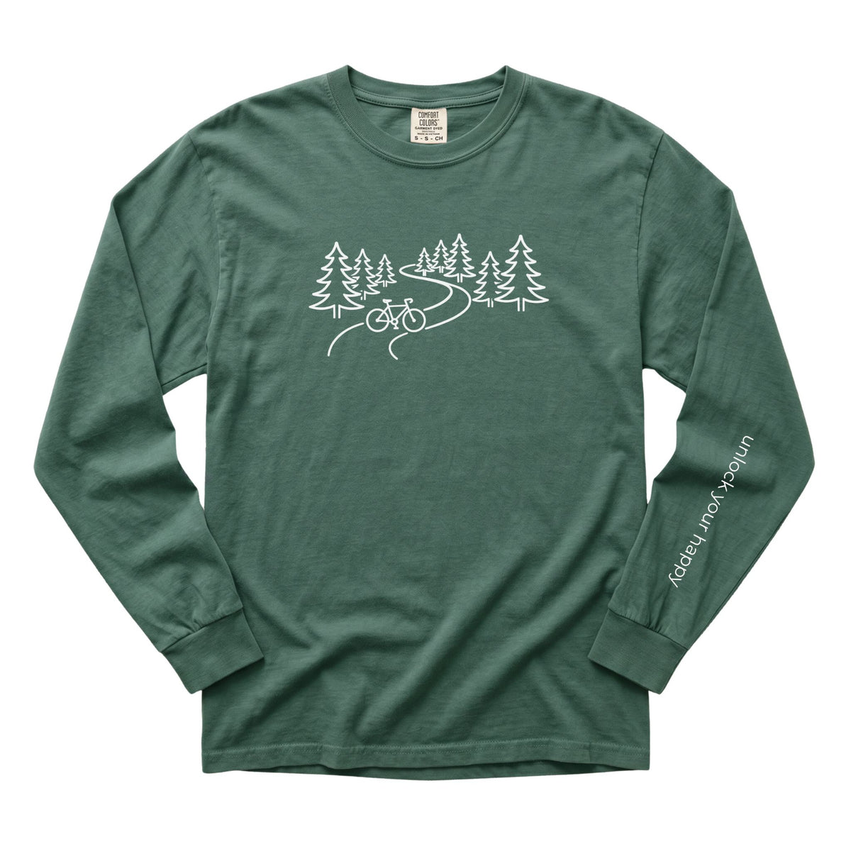 A long-sleeve crewneck t-shirt in a forest blue green color, featuring a white line art graphic of pine trees, a winding road, and a bicycle on the chest, with 'Unlock Your Happy' printed vertically in white on the left sleeve.