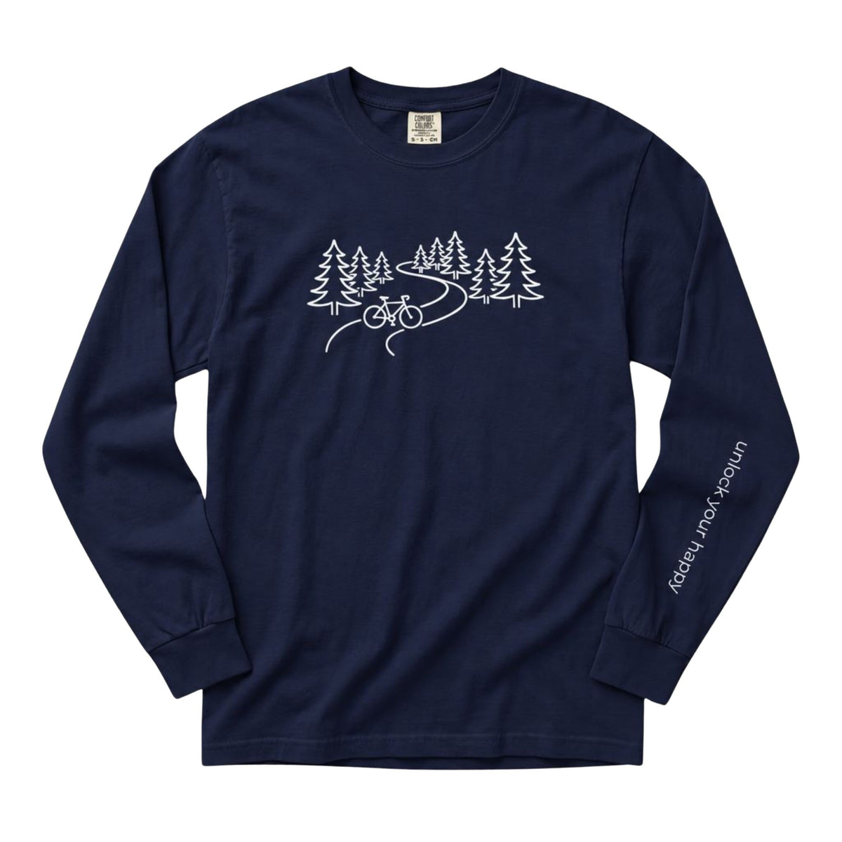A long-sleeve crewneck t-shirt in a navy blue color, featuring a white line art graphic of pine trees, a winding road, and a bicycle on the chest, with 'Unlock Your Happy' printed vertically in white on the left sleeve.