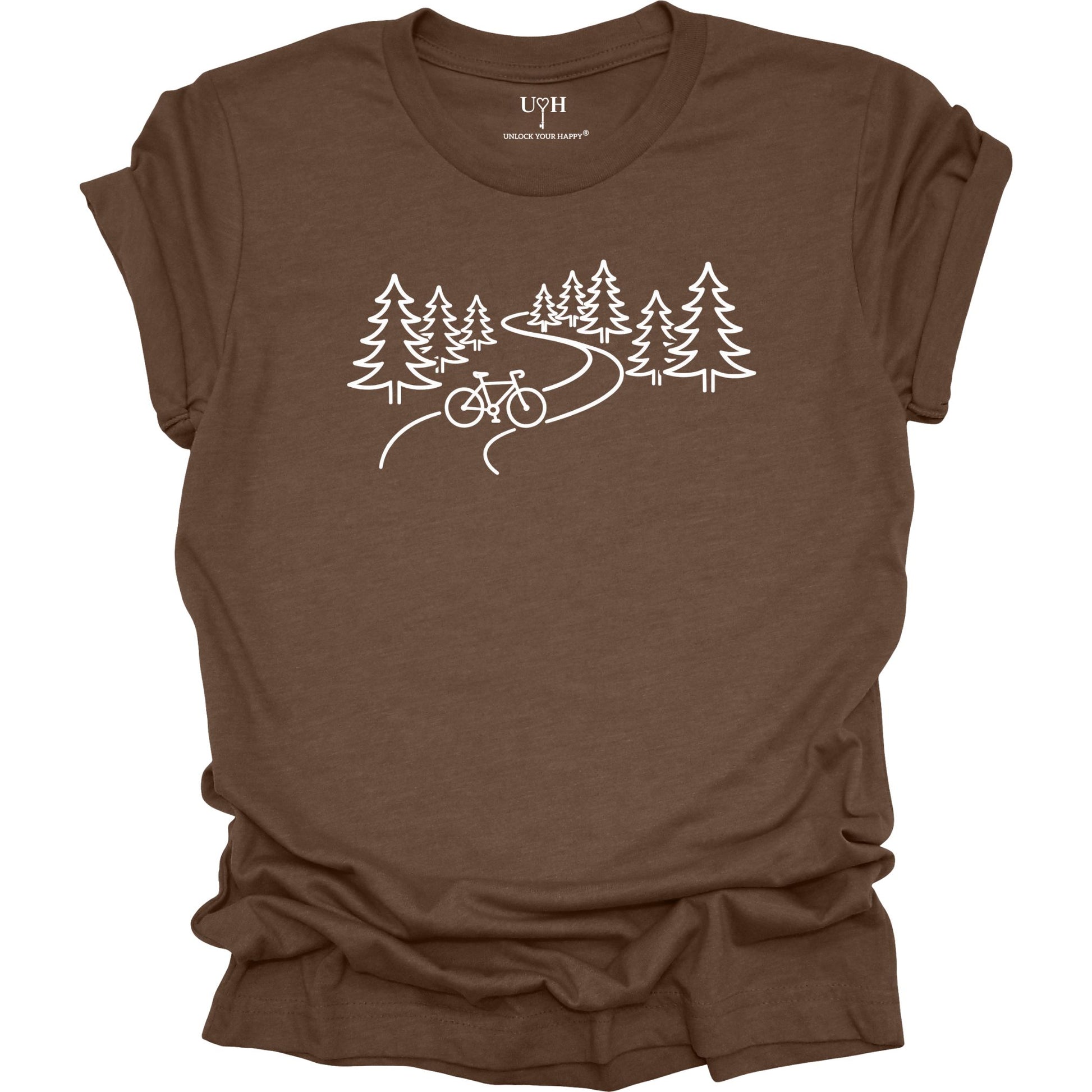 nature biking graphic brown t-shirt with minimalist forest trail and bicycle design, featuring “unlock your happy” text on sleeve