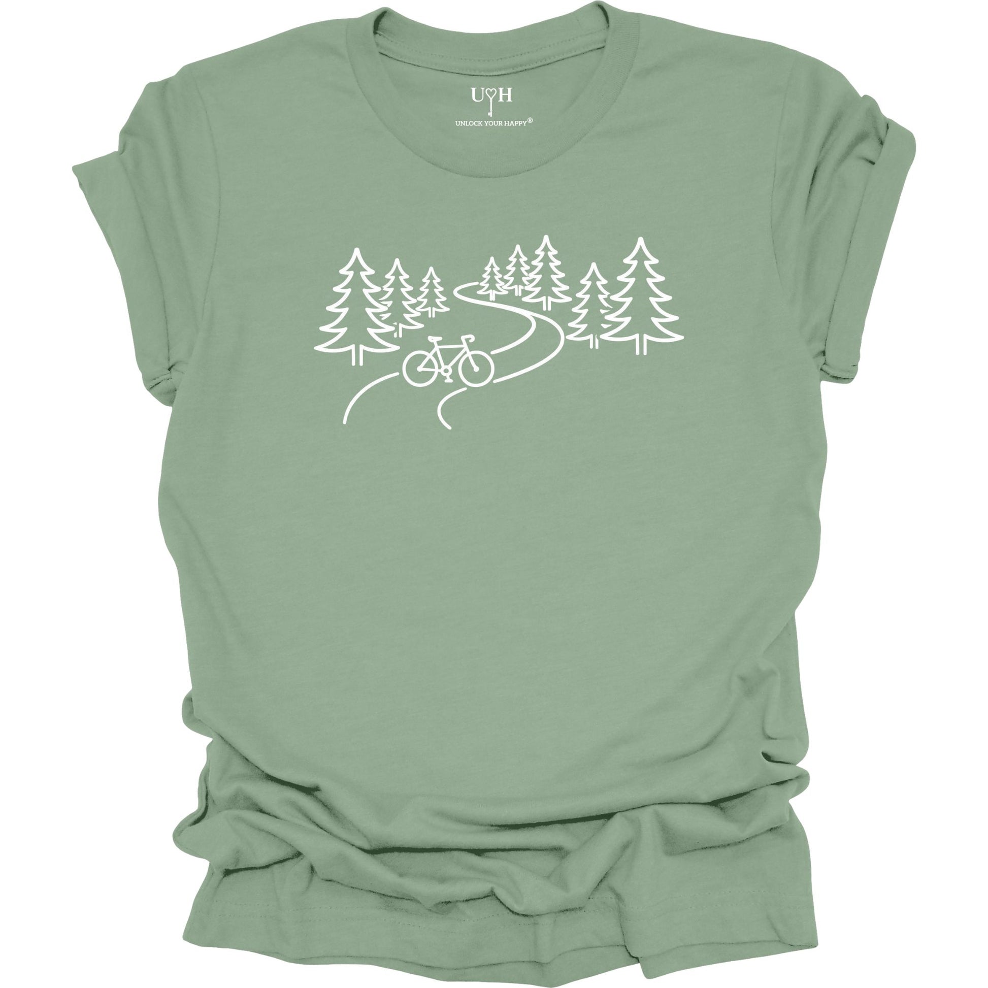 nature biking graphic sage t-shirt with minimalist forest trail and bicycle design, featuring “unlock your happy” text on sleeve