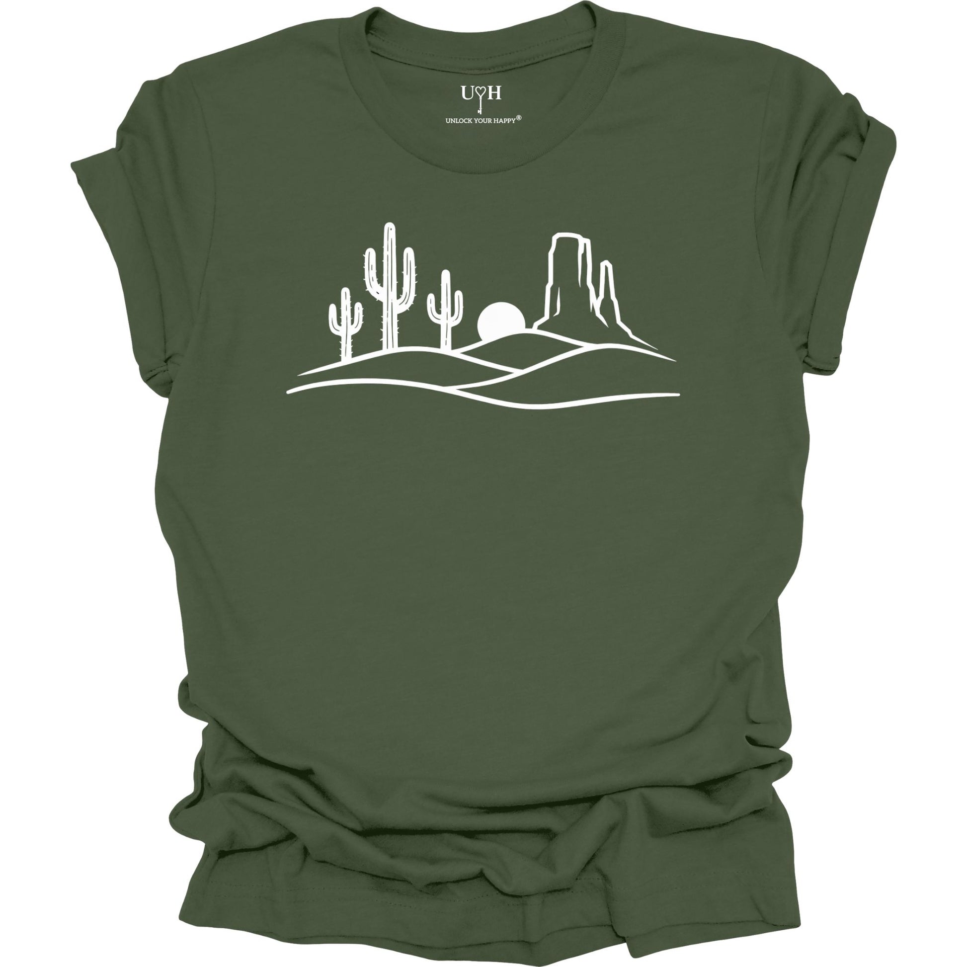 Green t-shirt with white desert landscape graphic on a white background