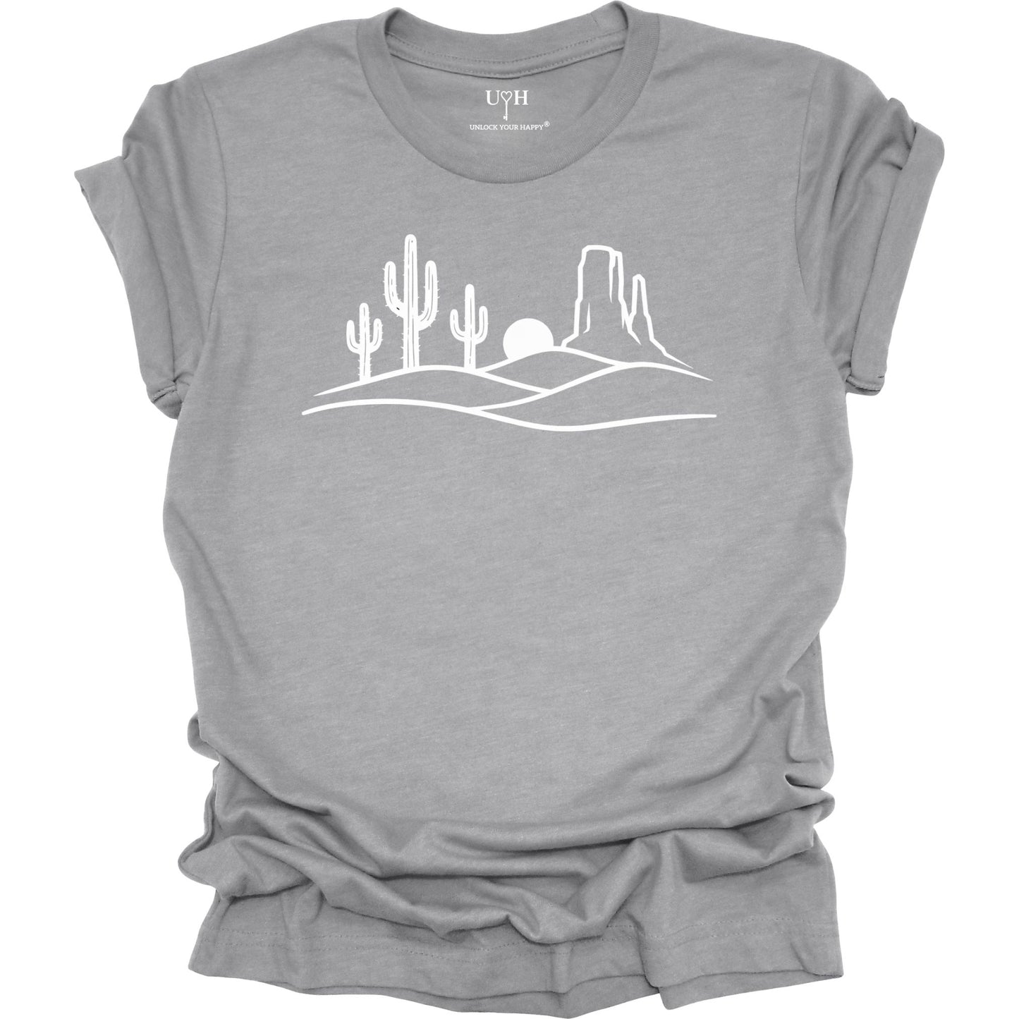 Gray t-shirt with a white desert landscape graphic on a white background