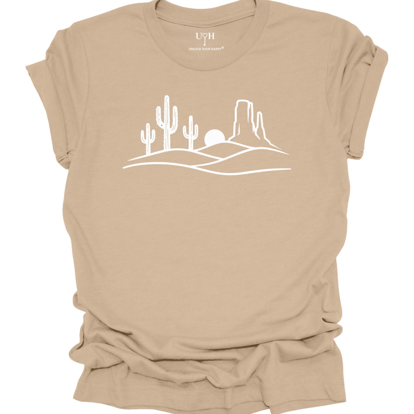 Tan  t-shirt with a white desert landscape graphic on a white background