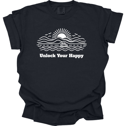 Camper van road trip Unlock Your Happy T-shirt in black Comfort Colors with road, ocean, mountain scene and sun design