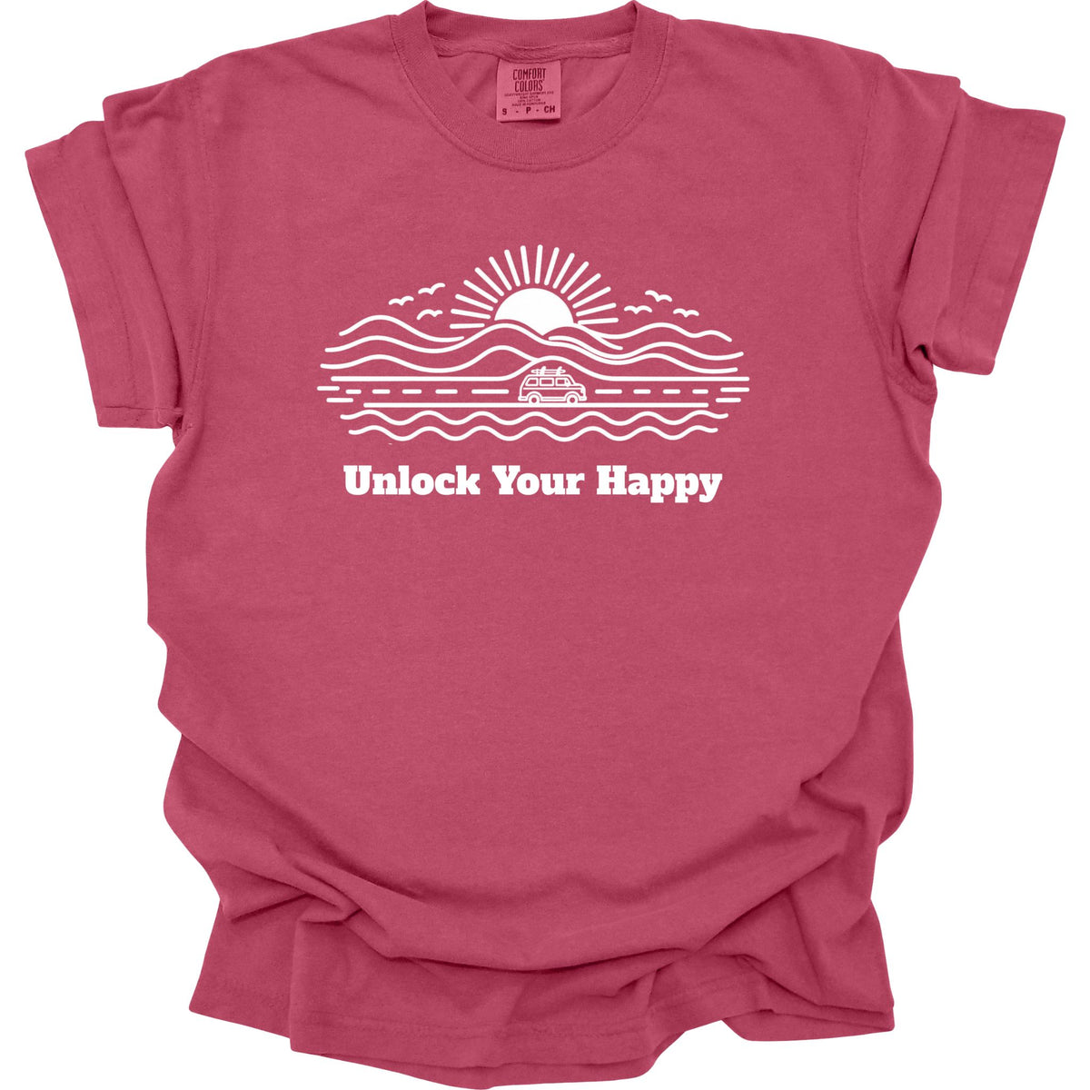 Camper van road trip Unlock Your Happy T-shirt in brick red Comfort Colors with road, ocean, mountain scene and sun design