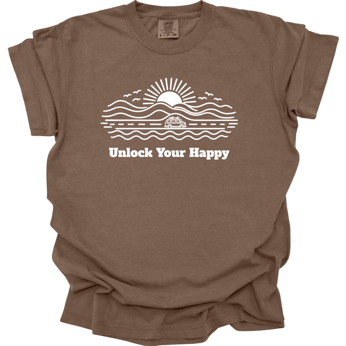 Camper van road trip Unlock Your Happy T-shirt in espresso brown Comfort Colors with road, ocean, mountain scene and sun design