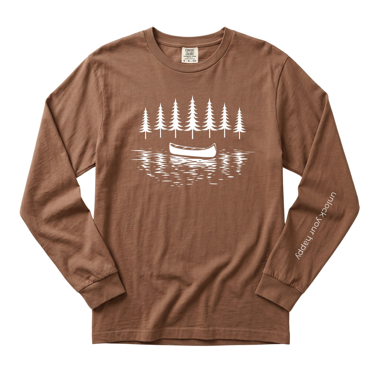 A brown long-sleeve t-shirt with a white graphic of pine trees and a canoe on the chest, and white text on the left sleeve reading 'unlock your happy'.