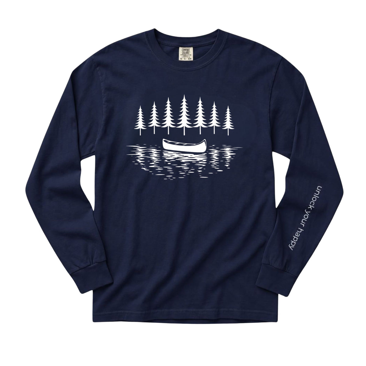A navy blue long-sleeve t-shirt with a white graphic print of pine trees, a canoe, and water reflections on the front, and white text on the left sleeve reading 'unlock your happy'.