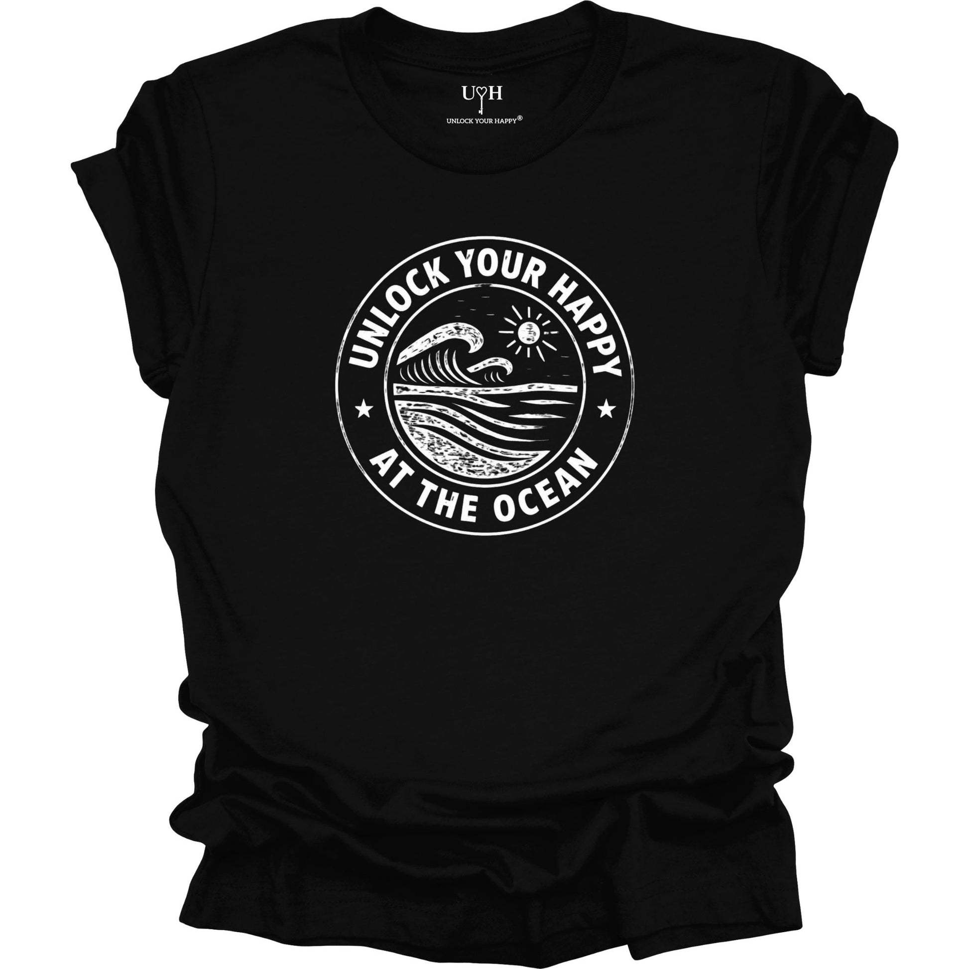 Unlock Your Happy at the Ocean graphic black t-shirt featuring a vintage wave and sun coastal design