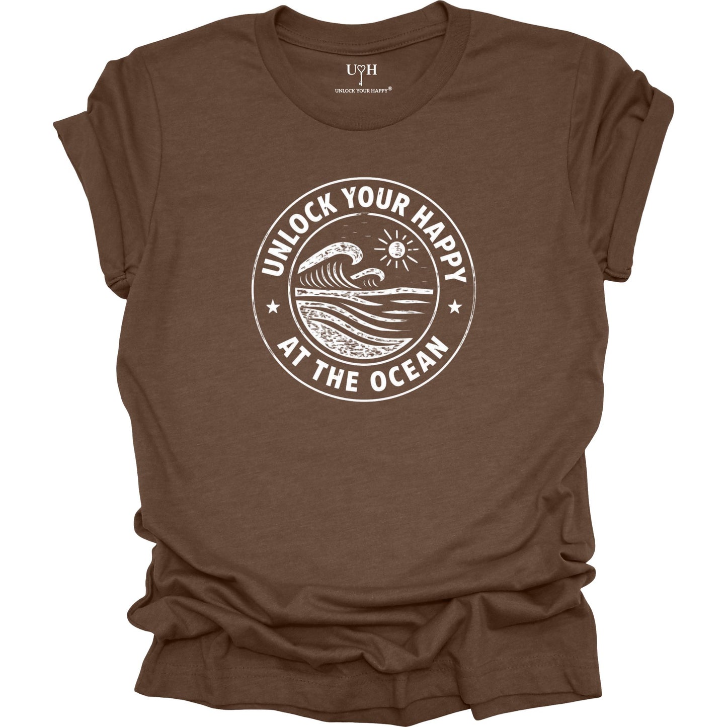Unlock Your Happy at the Ocean graphic brown t-shirt featuring a vintage wave and sun coastal design