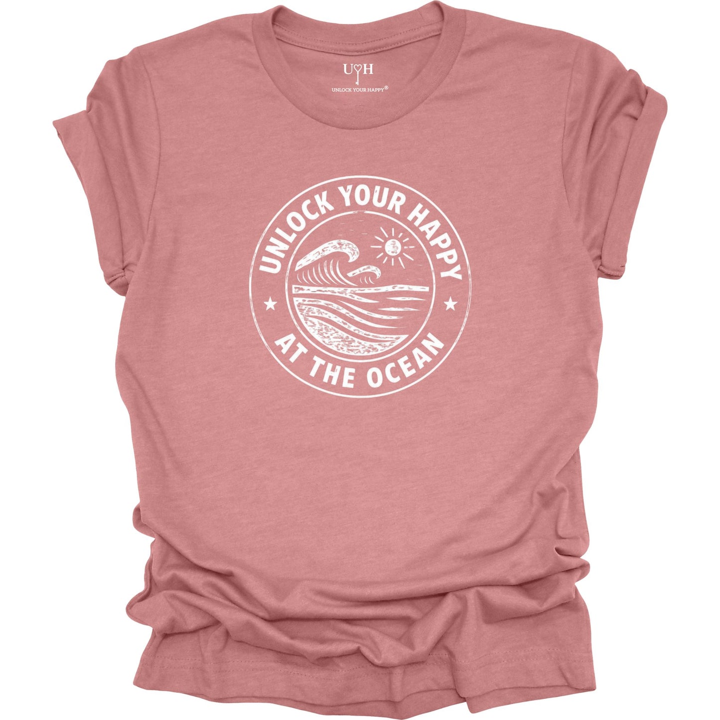 Unlock Your Happy at the Ocean graphic mauve t-shirt featuring a vintage wave and sun coastal design