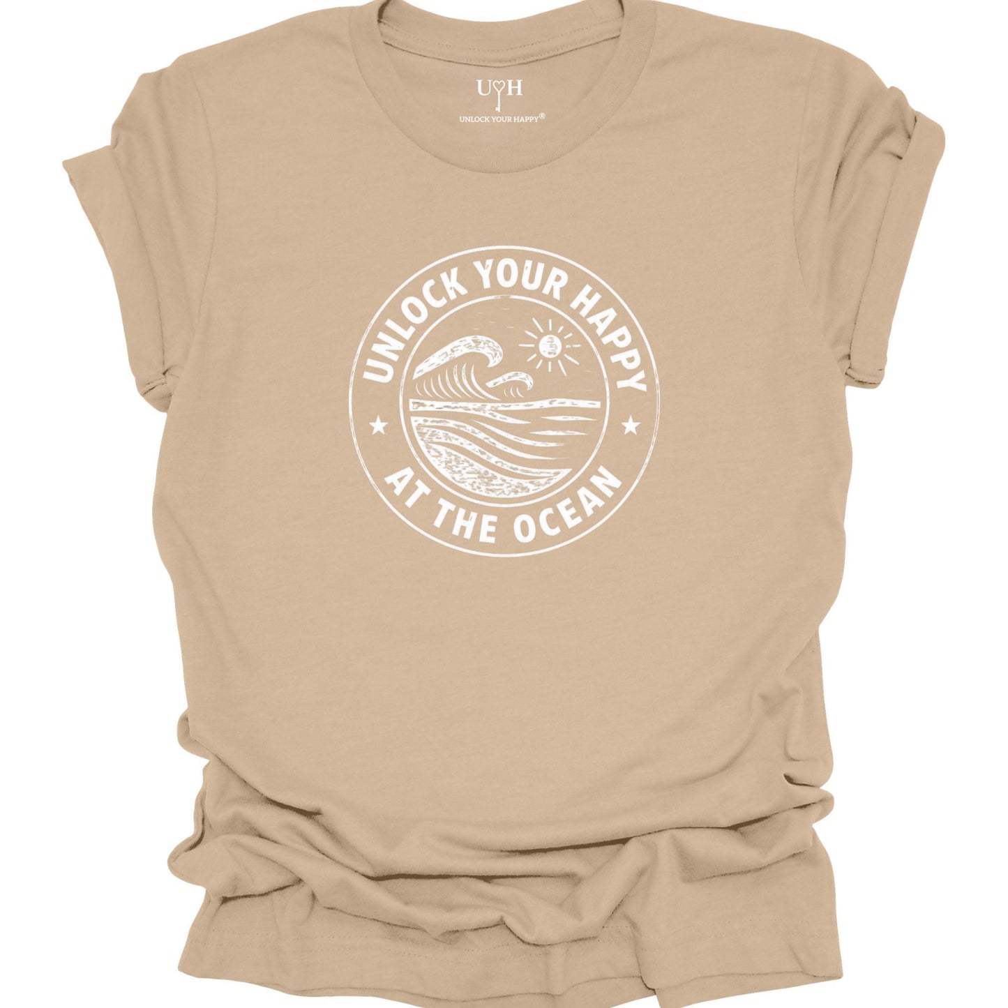 Unlock Your Happy at the Ocean graphic tan t-shirt featuring a vintage wave and sun coastal design