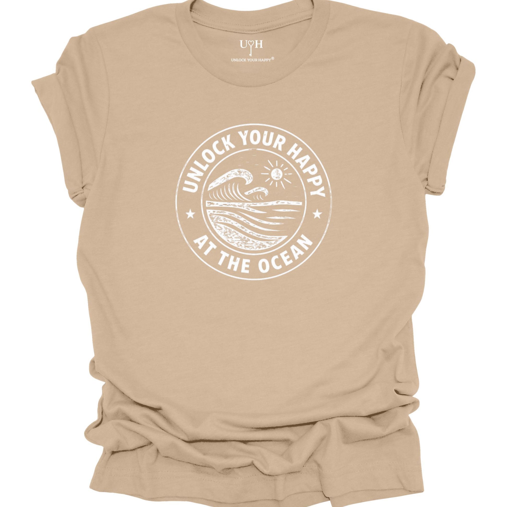 Unlock Your Happy at the Ocean graphic tan t-shirt featuring a vintage wave and sun coastal design