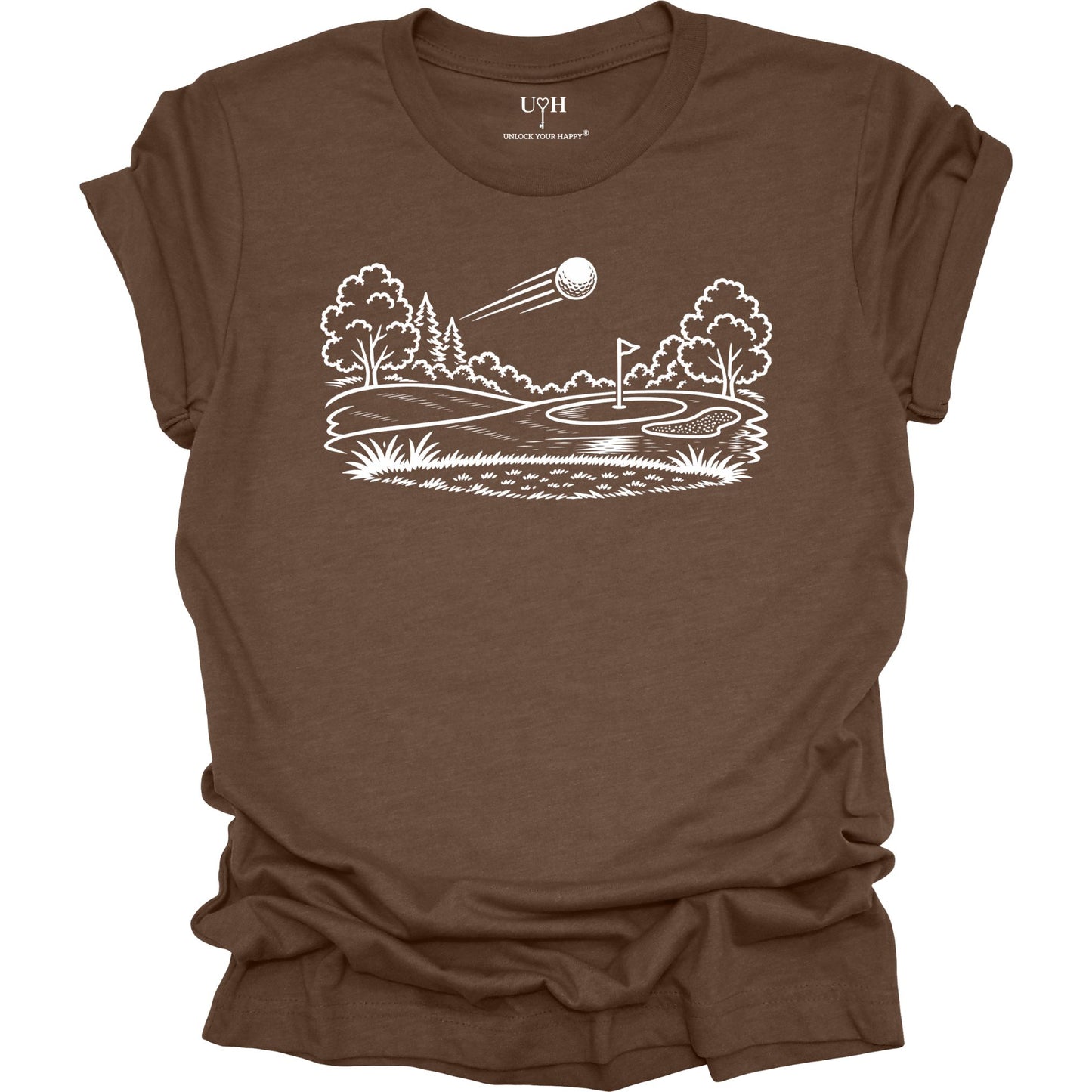 Minimalist golf course graphic t-shirt with line art design of golf ball and green on soft unisex brown tee
