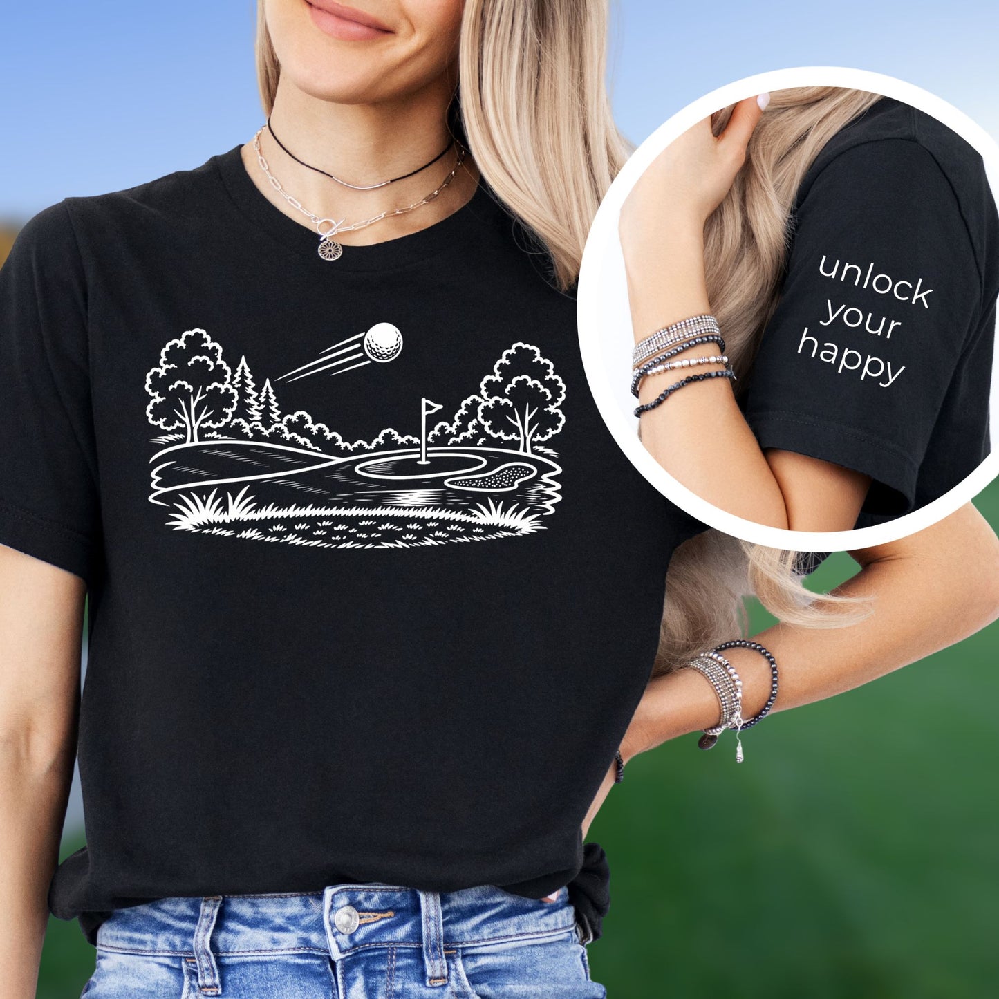 Minimalist golf course graphic t-shirt  on black tee and unlock your happy text on sleeve