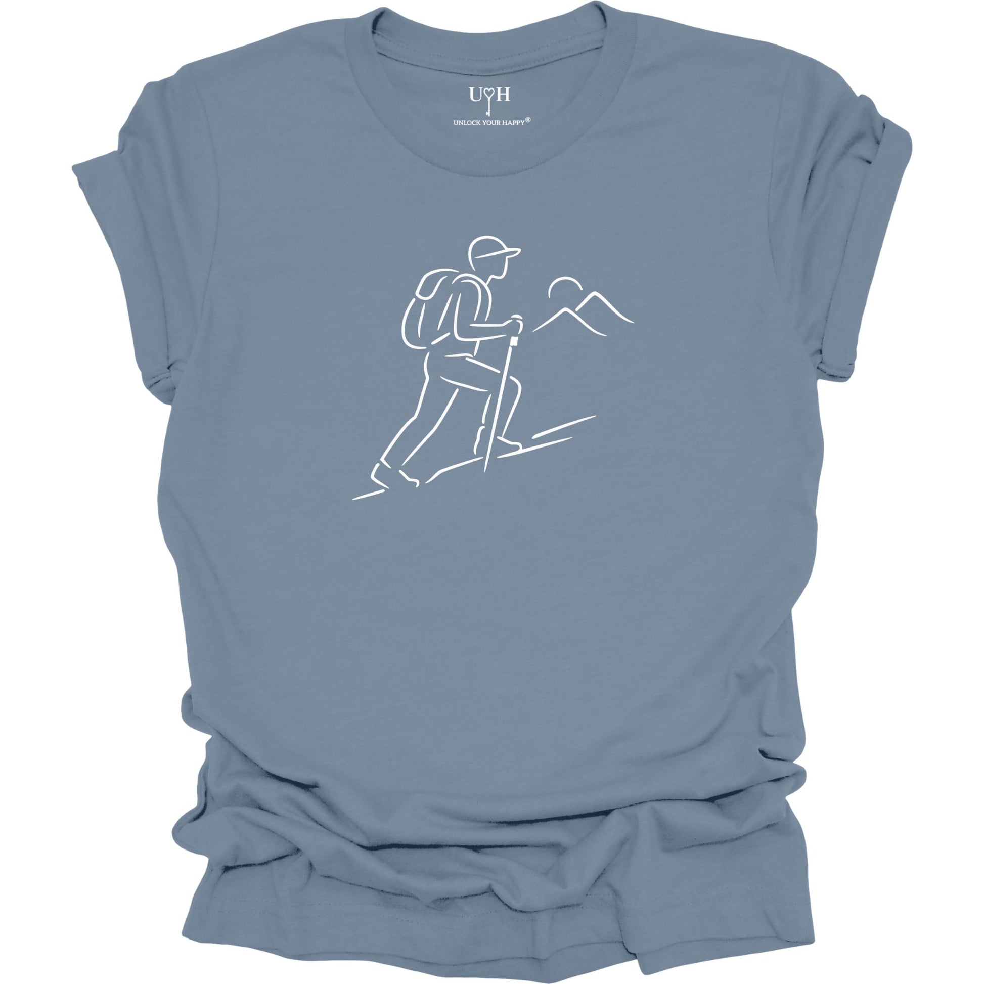 Blue t-shirt with a white line drawing of a hiker and mountains on a white background