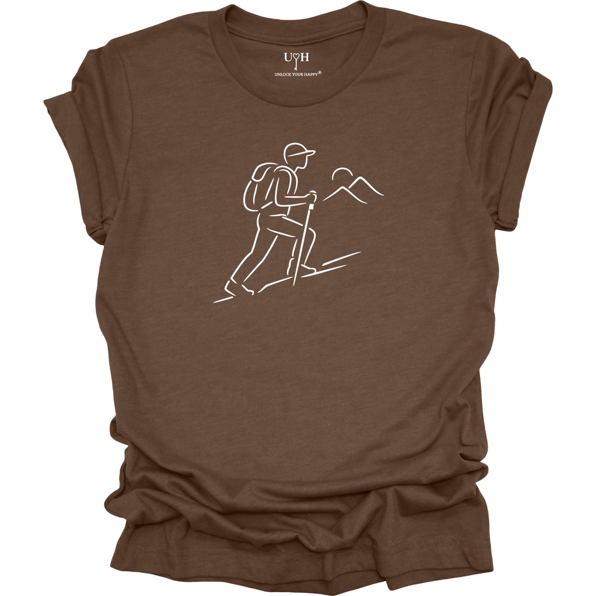 Brown t-shirt with a white line drawing of a hiker and mountains on a white background