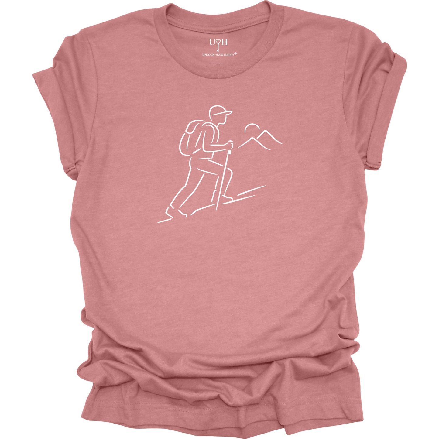 Mauve t-shirt with a white line drawing of a hiker and mountains on a white background