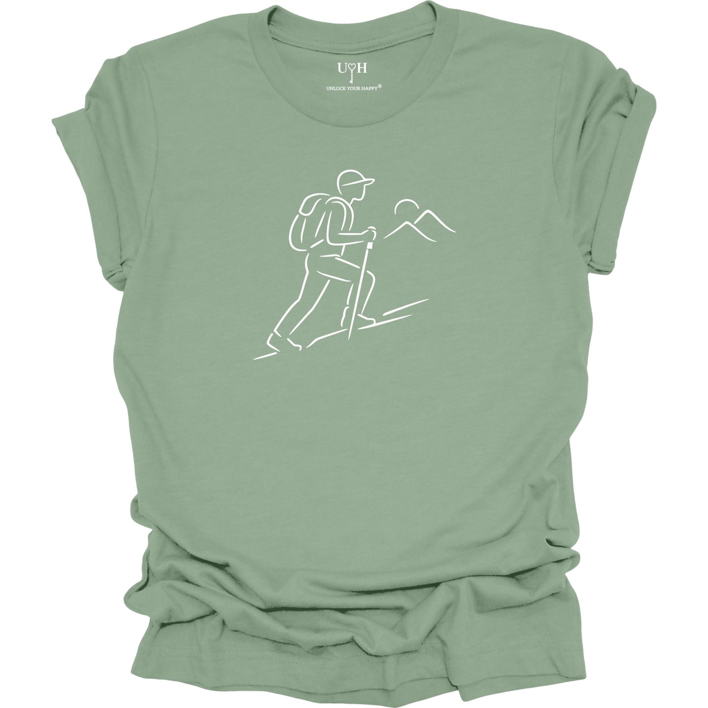 Sage t-shirt with a white line drawing of a hiker and mountains on a white background