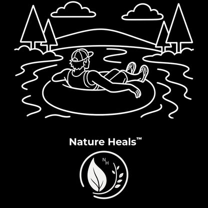 Man on an inner tube in a lake with mountains and trees, featuring 'Nature Heals' logo.