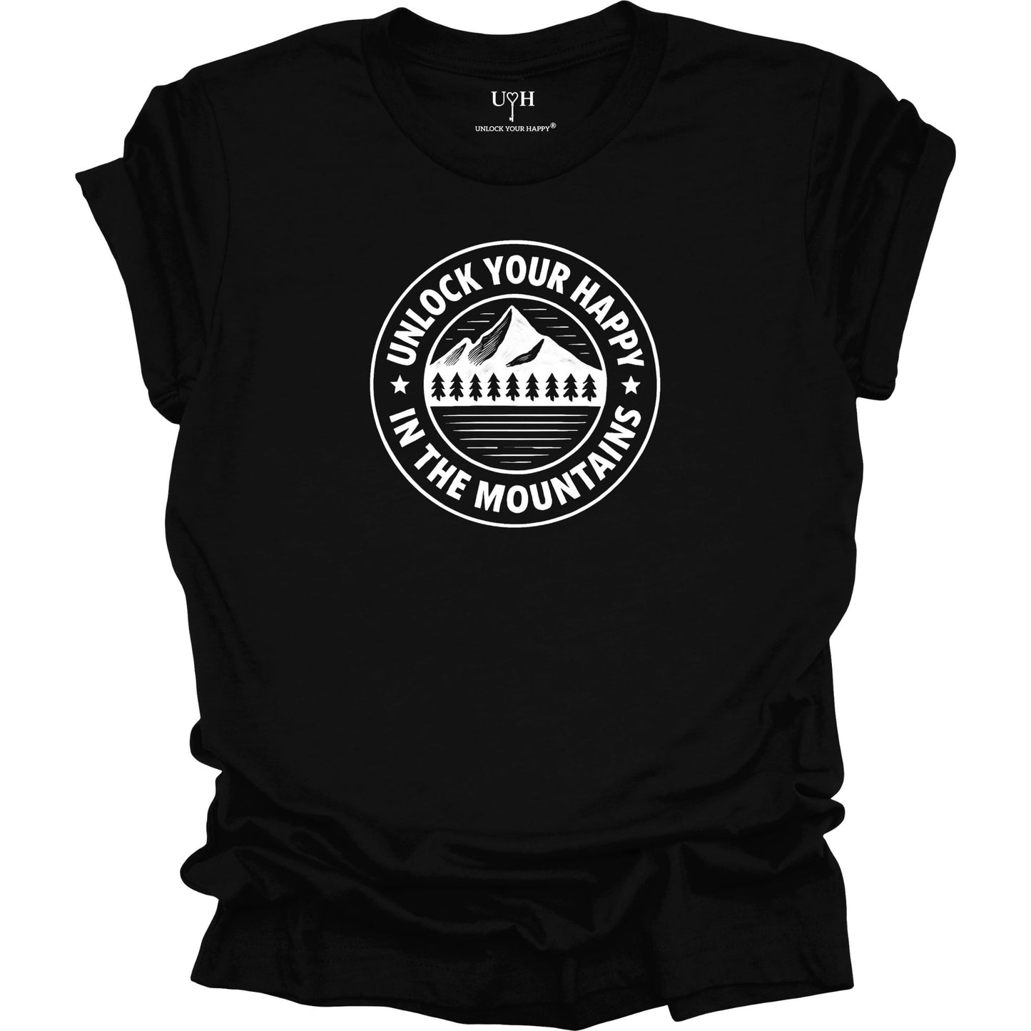 Black unisex graphic t-shirt featuring a circular mountain and pine tree design with the text “Unlock Your Happy in the Mountains”.