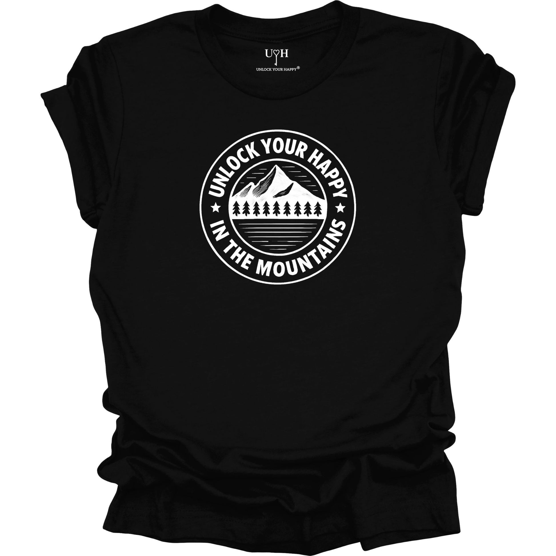 Black unisex graphic t-shirt featuring a circular mountain and pine tree design with the text “Unlock Your Happy in the Mountains”.