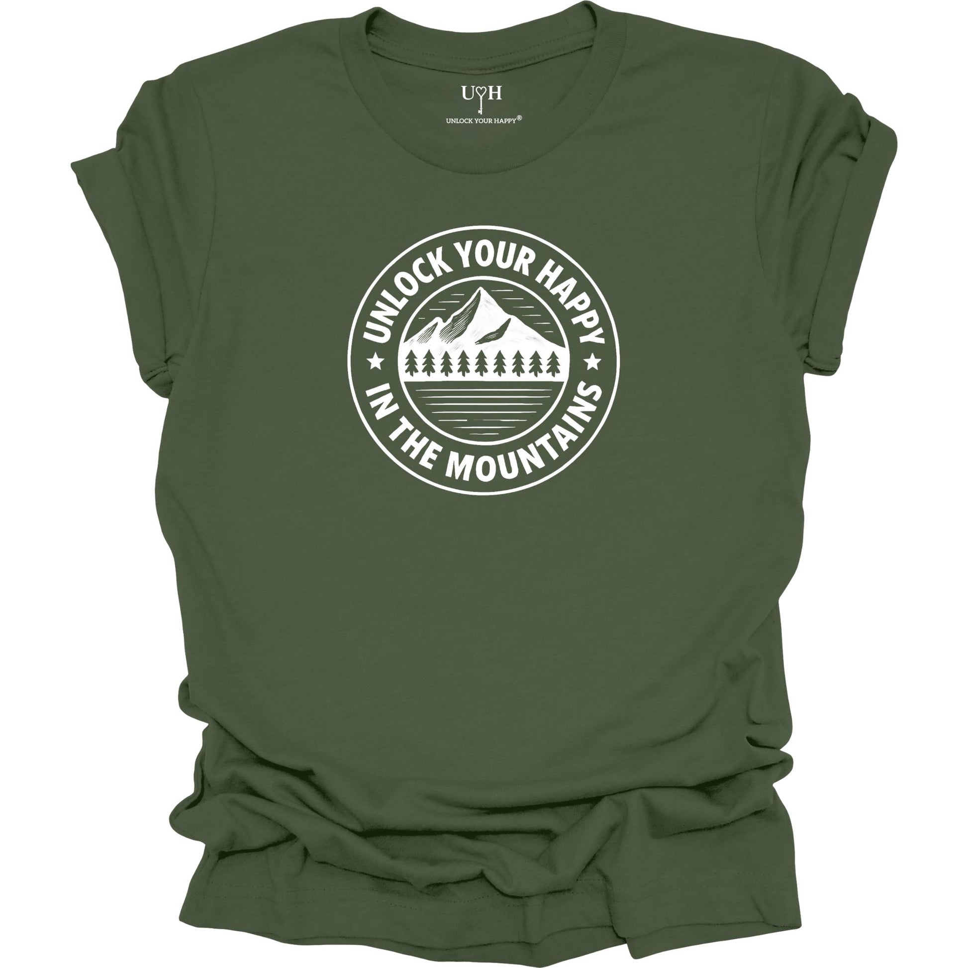 Green unisex graphic t-shirt featuring a circular mountain and pine tree design with the text “Unlock Your Happy in the Mountains”.
