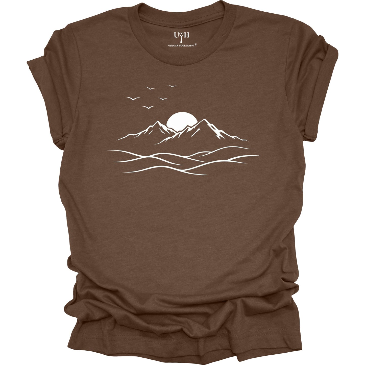 Brown t-shirt with white mountain and sun design on a white background