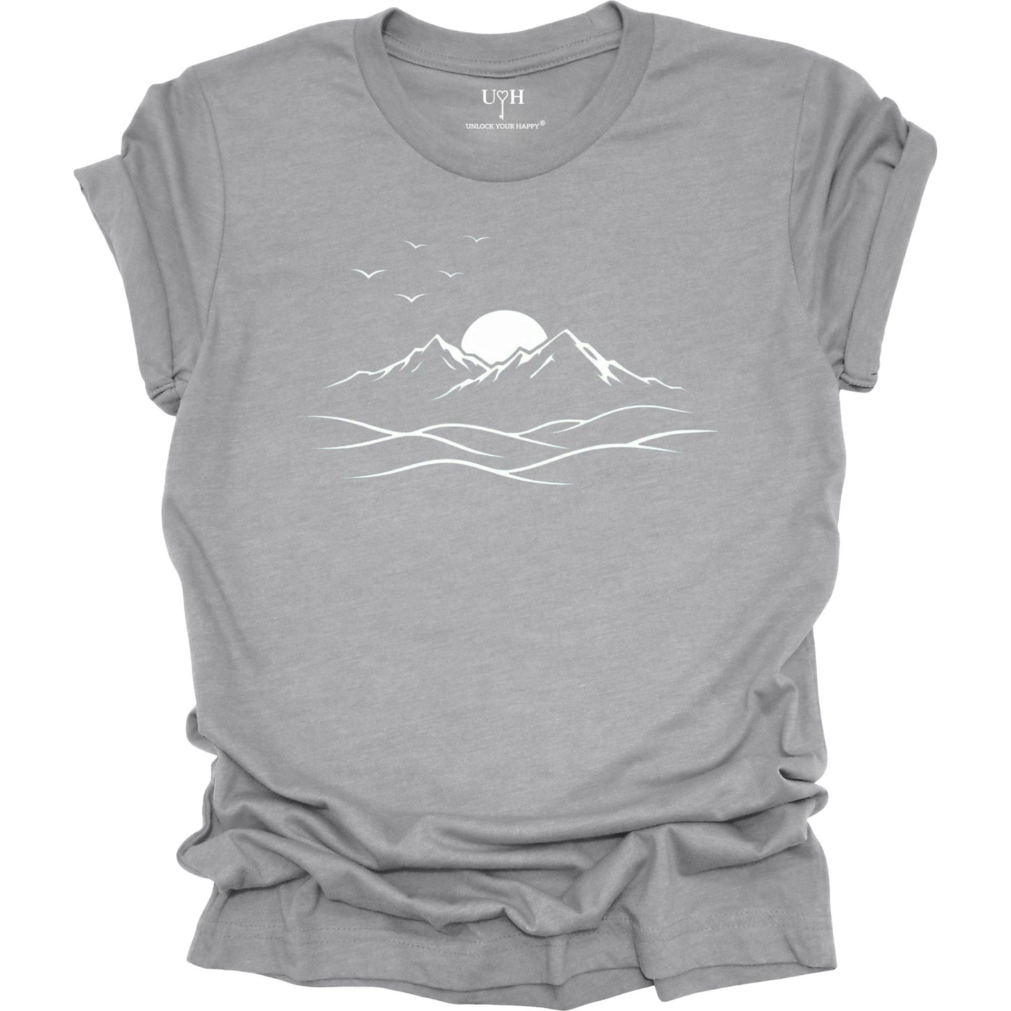 Gray t-shirt with a mountain-themed graphic and text on a white background