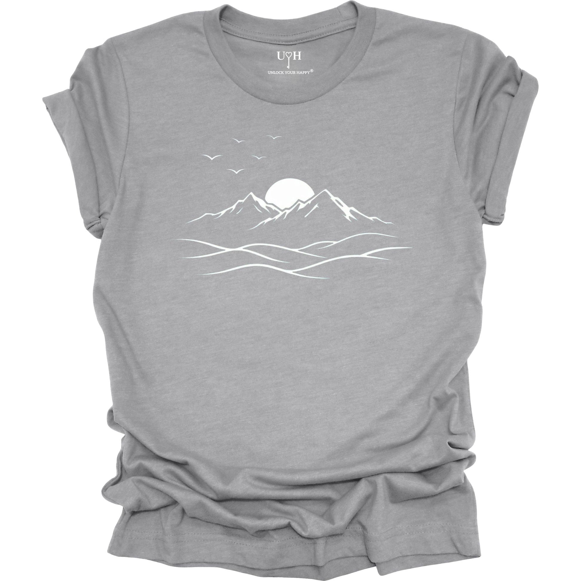 Gray t-shirt with a mountain-themed graphic and text on a white background