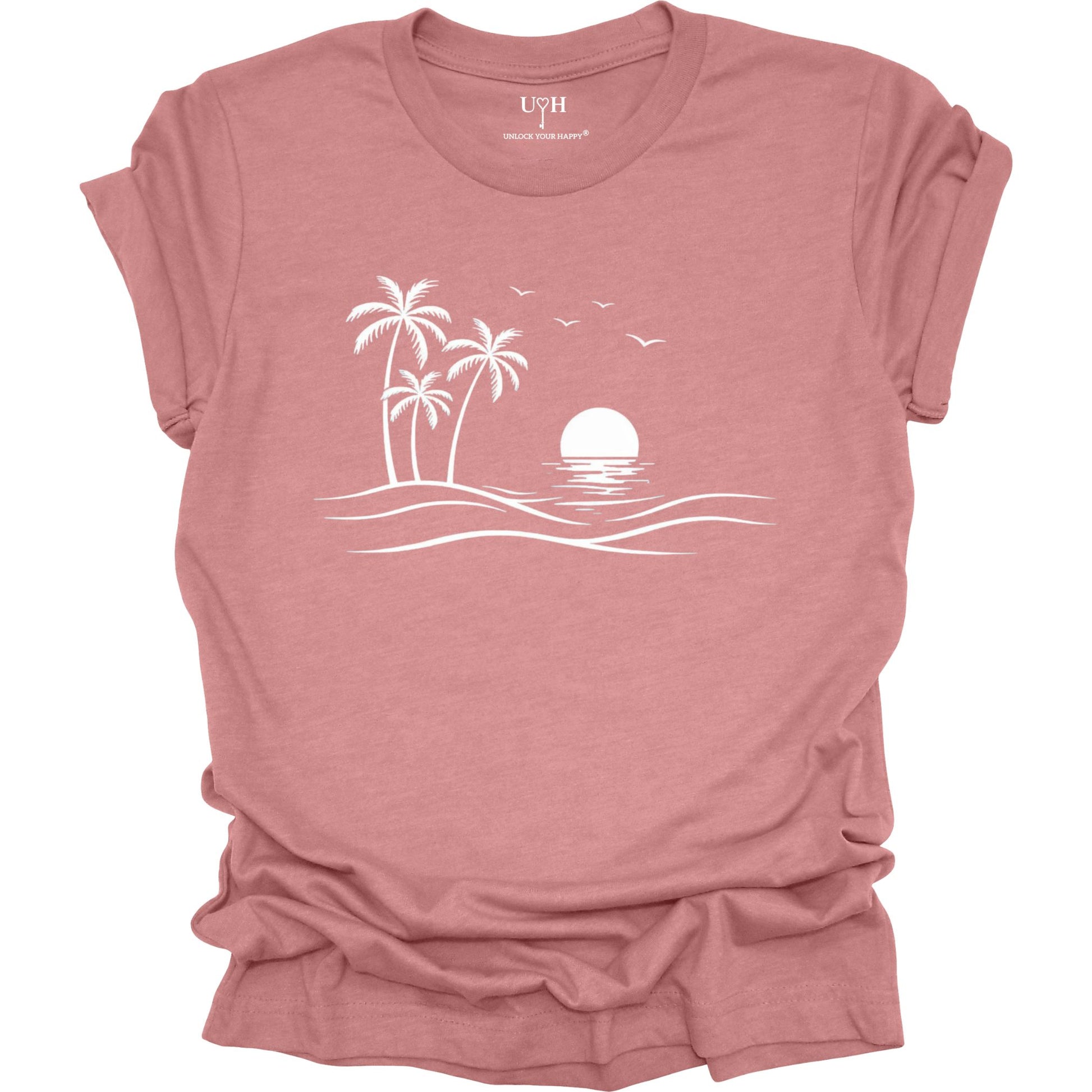 Mauve  t-shirt with a white beach graphic on a white background