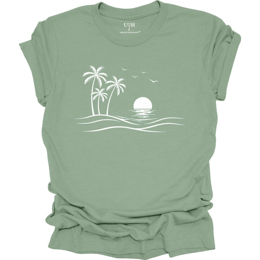 Sage t-shirt with a white beach graphic on a white background