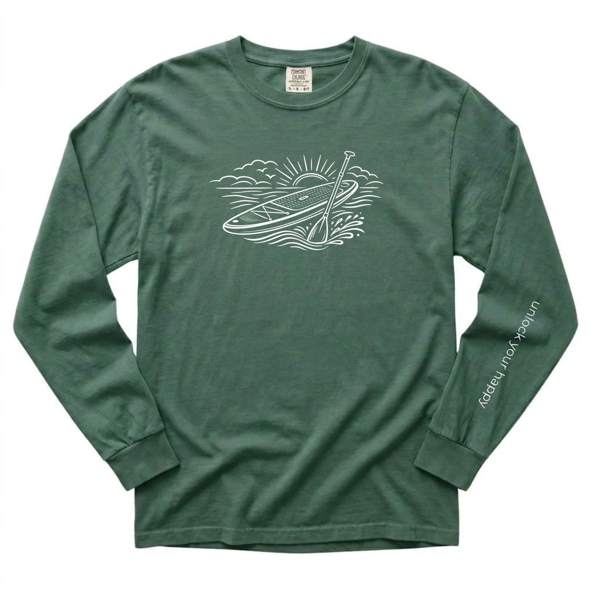 Unlock Your Happy paddleboard long sleeve shirt featuring a white paddleboard and sunrise graphic on a blue spruce color Comfort Colors tee