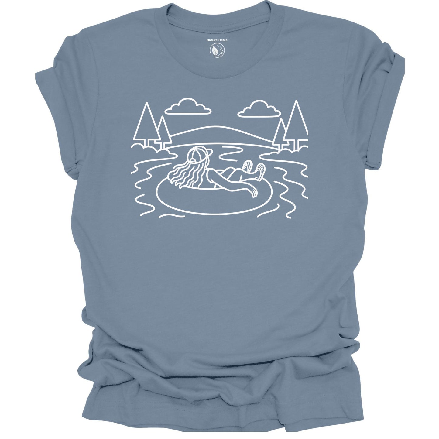 Nature Heals river tubing graphic blue t-shirt with minimalist outdoor water and tree line art design