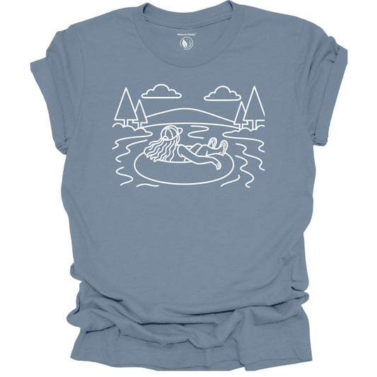 Nature Heals river tubing graphic blue t-shirt with minimalist outdoor water and tree line art design