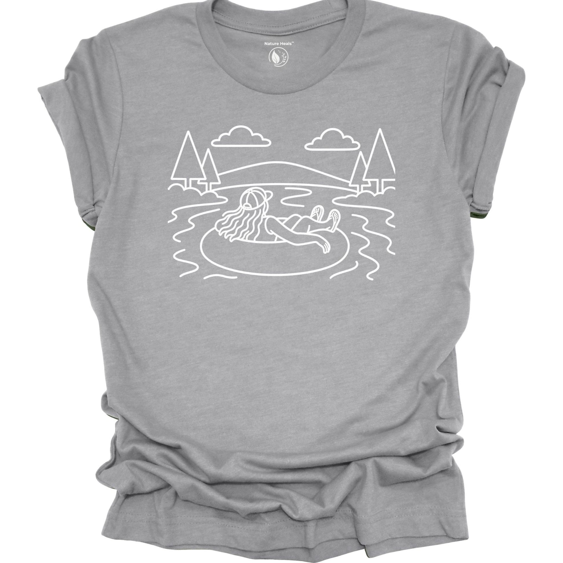 Nature Heals river tubing gray graphic t-shirt with minimalist outdoor water and tree line art design