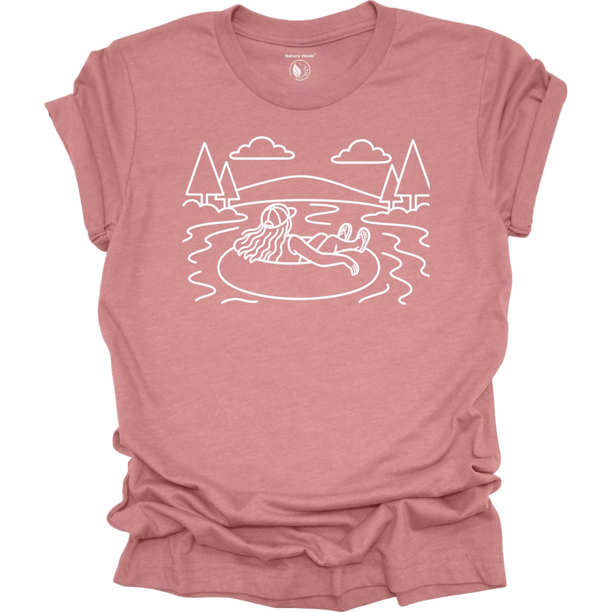 Nature Heals river tubing graphic mauve t-shirt with minimalist outdoor water and tree line art design