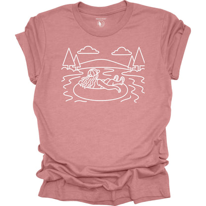 Nature Heals river tubing graphic mauve t-shirt with minimalist outdoor water and tree line art design