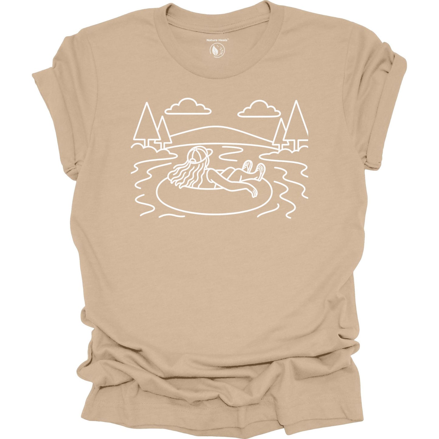 Nature Heals river tubing graphic tan t-shirt with minimalist outdoor water and tree line art design
