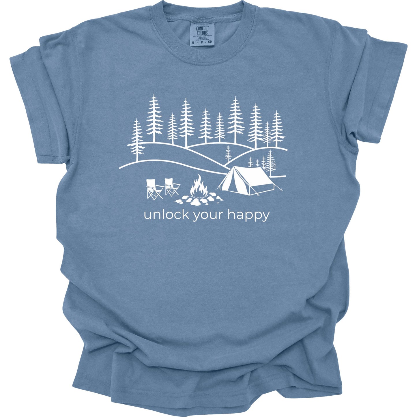 Blue t-shirt with white camping graphic and unlock your happy text on a white background