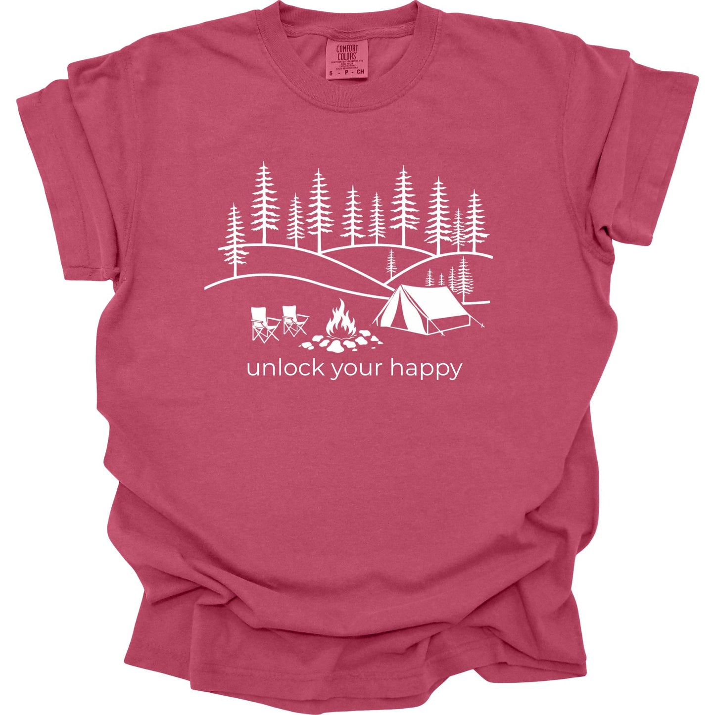 Brick red t-shirt with white camping graphic and text 'unlock your happy' on a white background